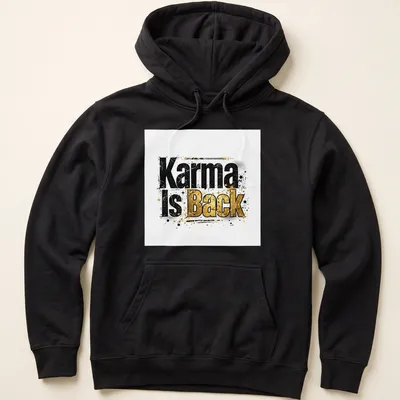 Grunge typography t-shirt featuring the phrase Karma Is Back in bold black, gold, and white — printed on a unisex hoodie