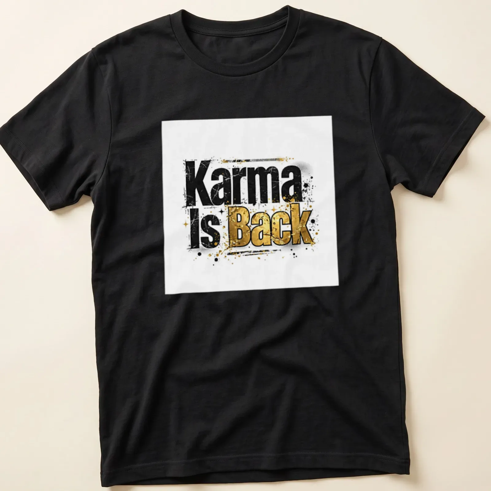 Grunge typography t-shirt featuring the phrase Karma Is Back in bold black, gold, and white — printed on a unisex t-shirt