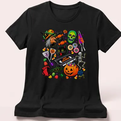 Colorful cartoon Halloween shirt featuring a black cat, pumpkin, and skull with Happy Halloween text — printed on a women's shirt