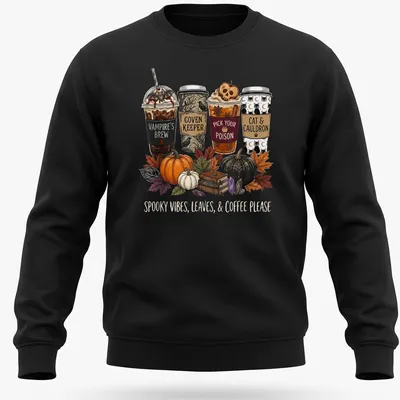 Whimsical illustration of Halloween-themed coffee cups with text about spooky vibes — printed on a unisex sweatshirt