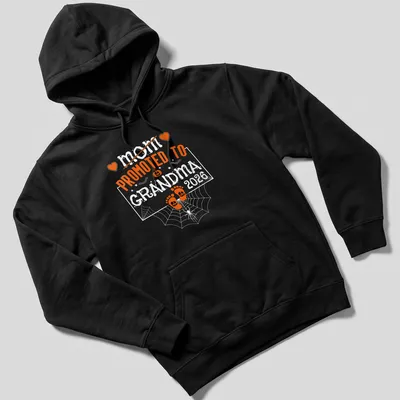 Playful Halloween design with pumpkins and feet, featuring text 'Mom Promoted To Grandma 2026' — printed on a unisex hoodie