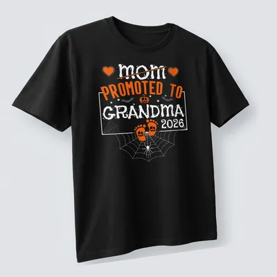 Playful Halloween design with pumpkins and feet, featuring text 'Mom Promoted To Grandma 2026' — printed on a unisex t-shirt (angled view)