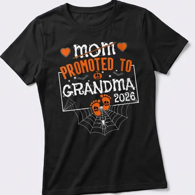 Playful Halloween design with pumpkins and feet, featuring text 'Mom Promoted To Grandma 2026' — printed on a women's shirt
