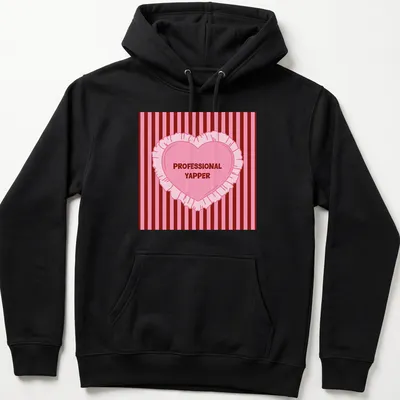Cartoon heart design with humorous Professional Yapper text in pink and red — printed on a unisex hoodie