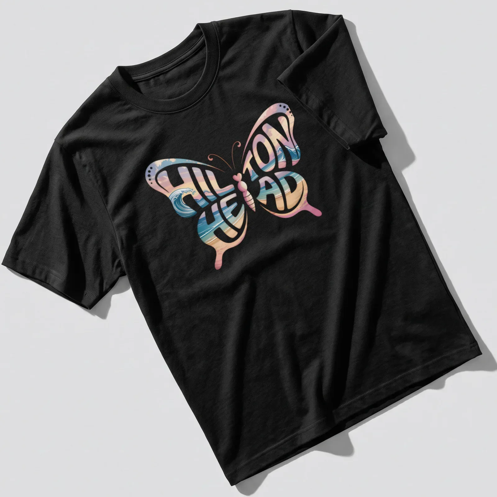 Vintage style t-shirt featuring a butterfly and ocean waves with Hilton Head text — printed on a unisex t-shirt