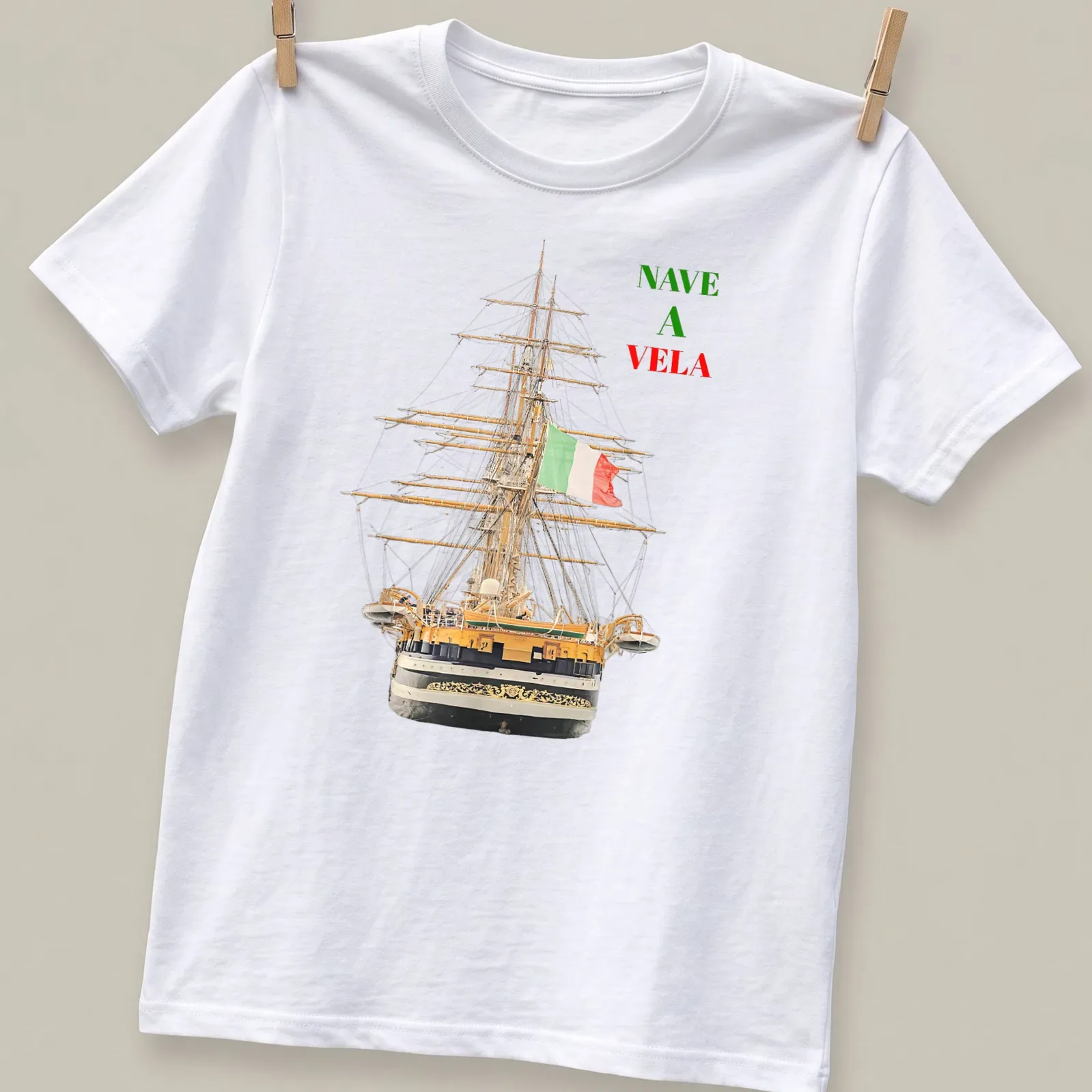 Realistic illustration of an Italian tall ship with sails, featuring the text 'NAVE A VELA' — printed on a unisex t-shirt
