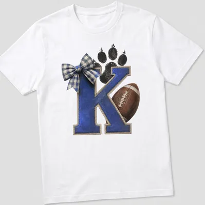 Vintage distressed shirt featuring a letter K, football, and paw print in blue and brown