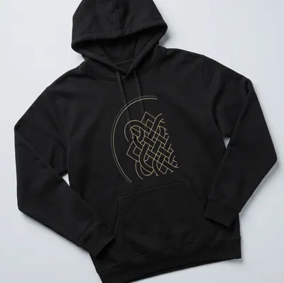 Minimalist line art of the Endless Knot in gold and white — printed on a unisex hoodie