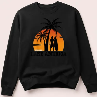 Tropical sunset design with surfing silhouette and text on — printed on a unisex sweatshirt