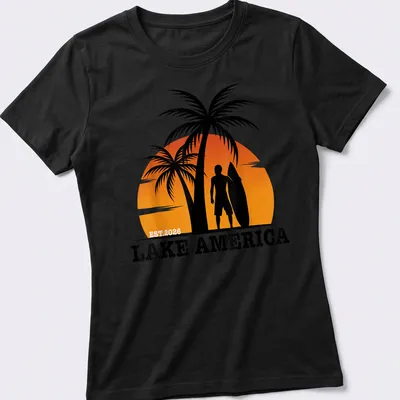 Tropical sunset design with surfing silhouette and text on — printed on a women's shirt