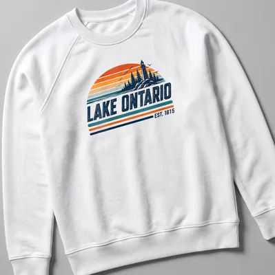 Vintage style t-shirt featuring Lake Ontario with a lighthouse and trees in nostalgic colors — printed on a unisex sweatshirt