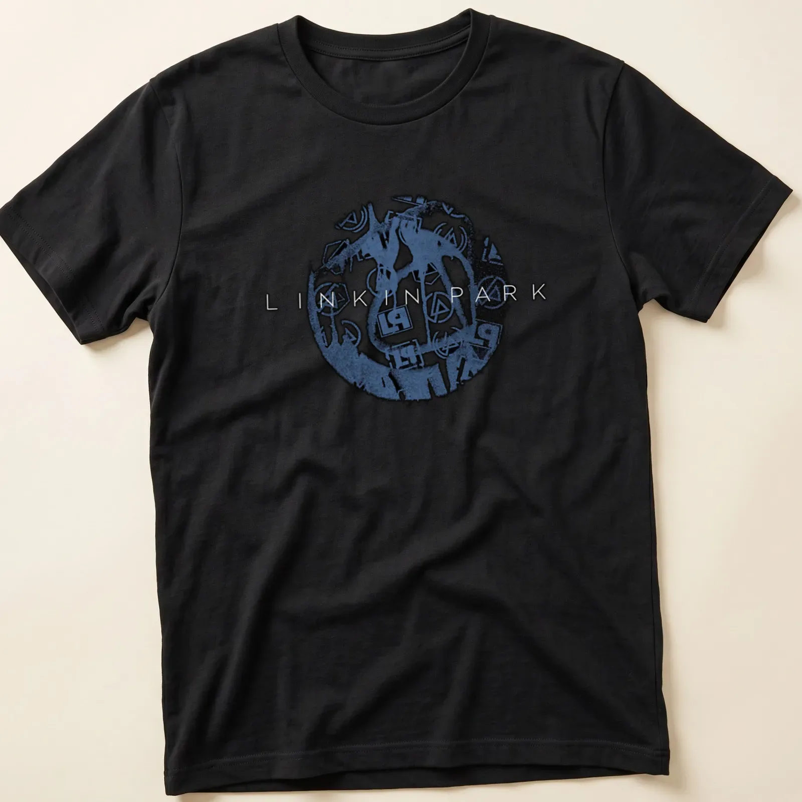 Linkin Park logo t-shirt featuring bold grunge style lettering in blue, black, and white — printed on a unisex t-shirt