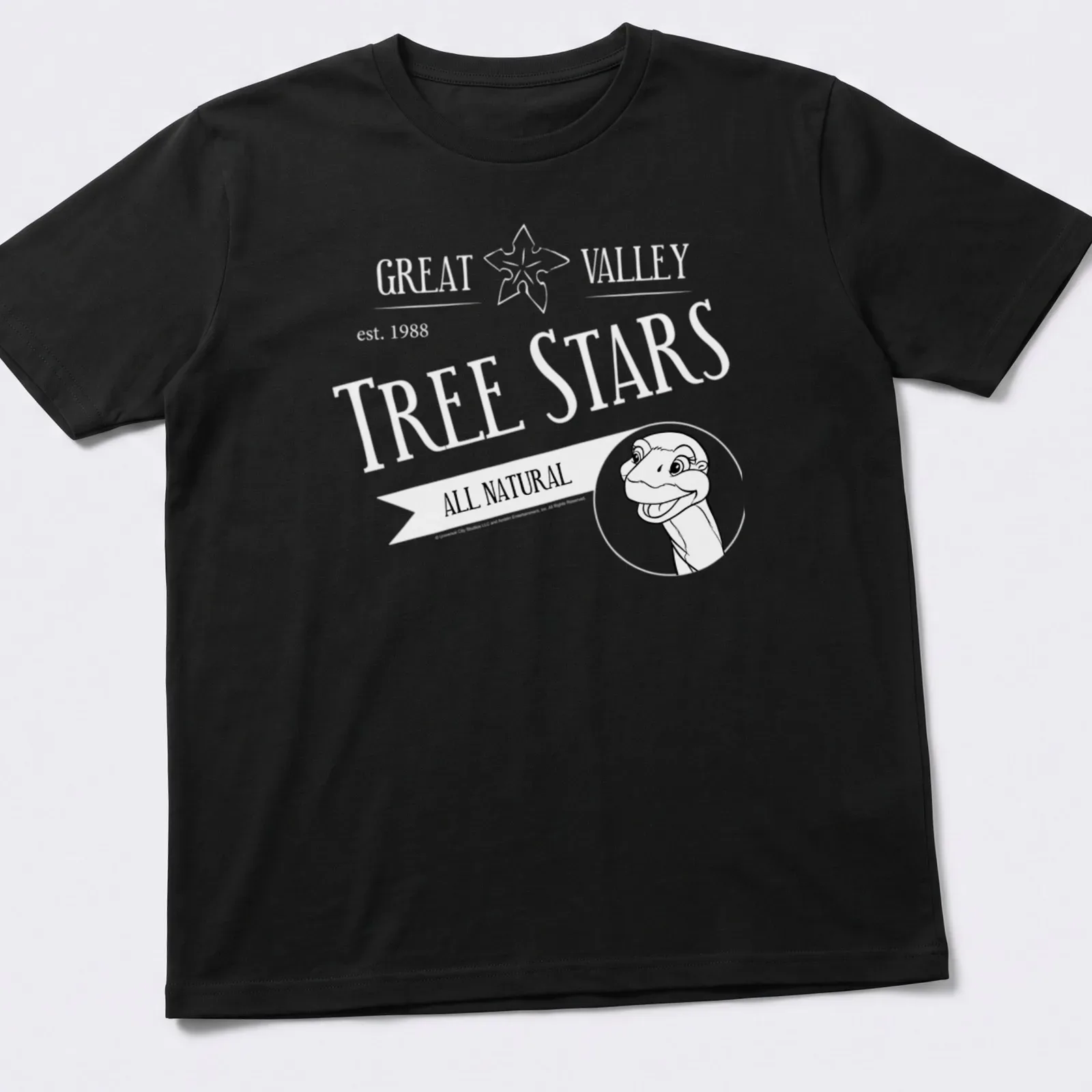 Black and white line art of a long neck dinosaur with the text All Natural below — printed on a unisex t-shirt