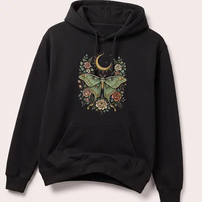 Illustration of a Luna moth surrounded by floral designs in green, gold, pink, and cream. — printed on a unisex hoodie