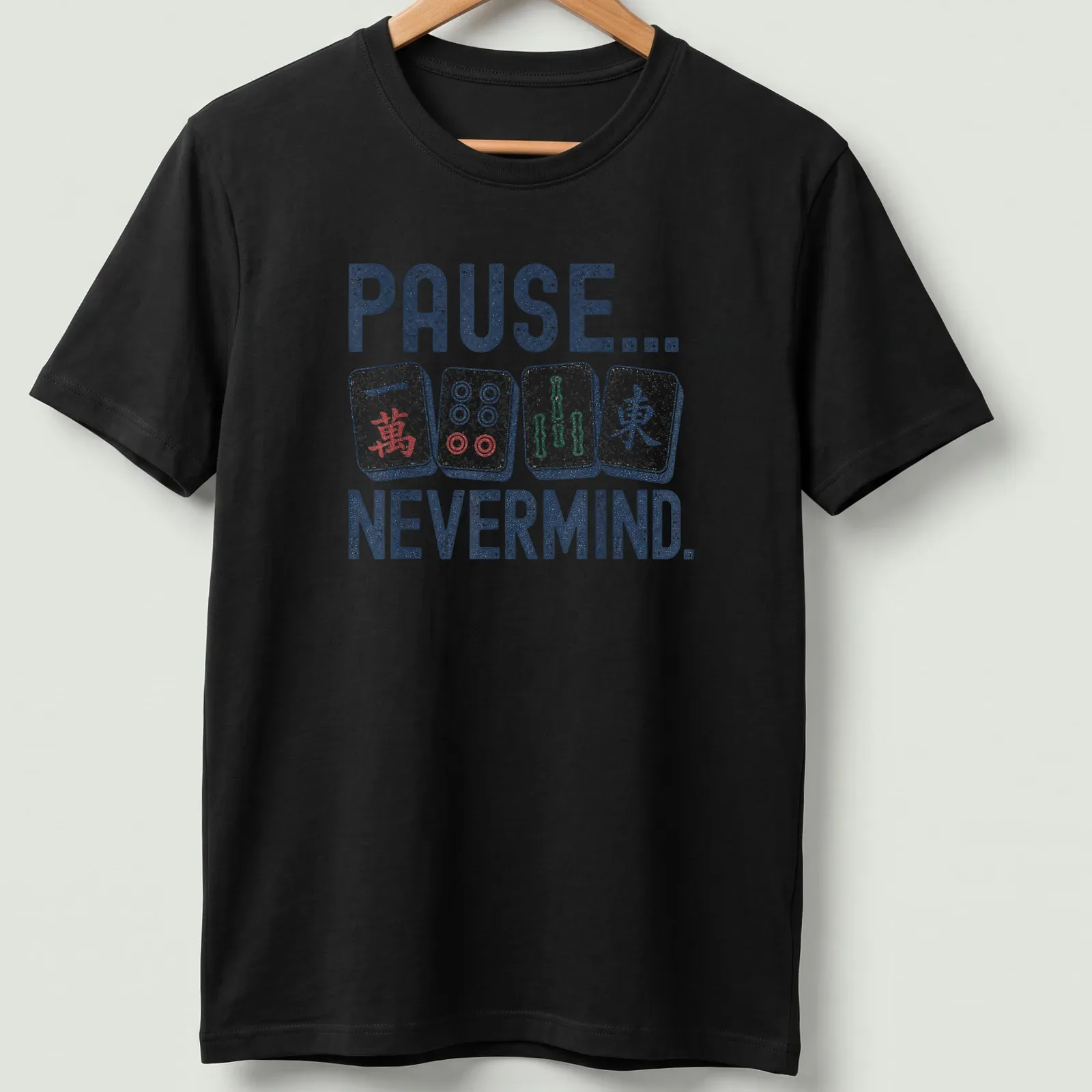 Playful Mahjong graphic tee with colorful Mahjong tiles and humorous text — printed on a unisex t-shirt
