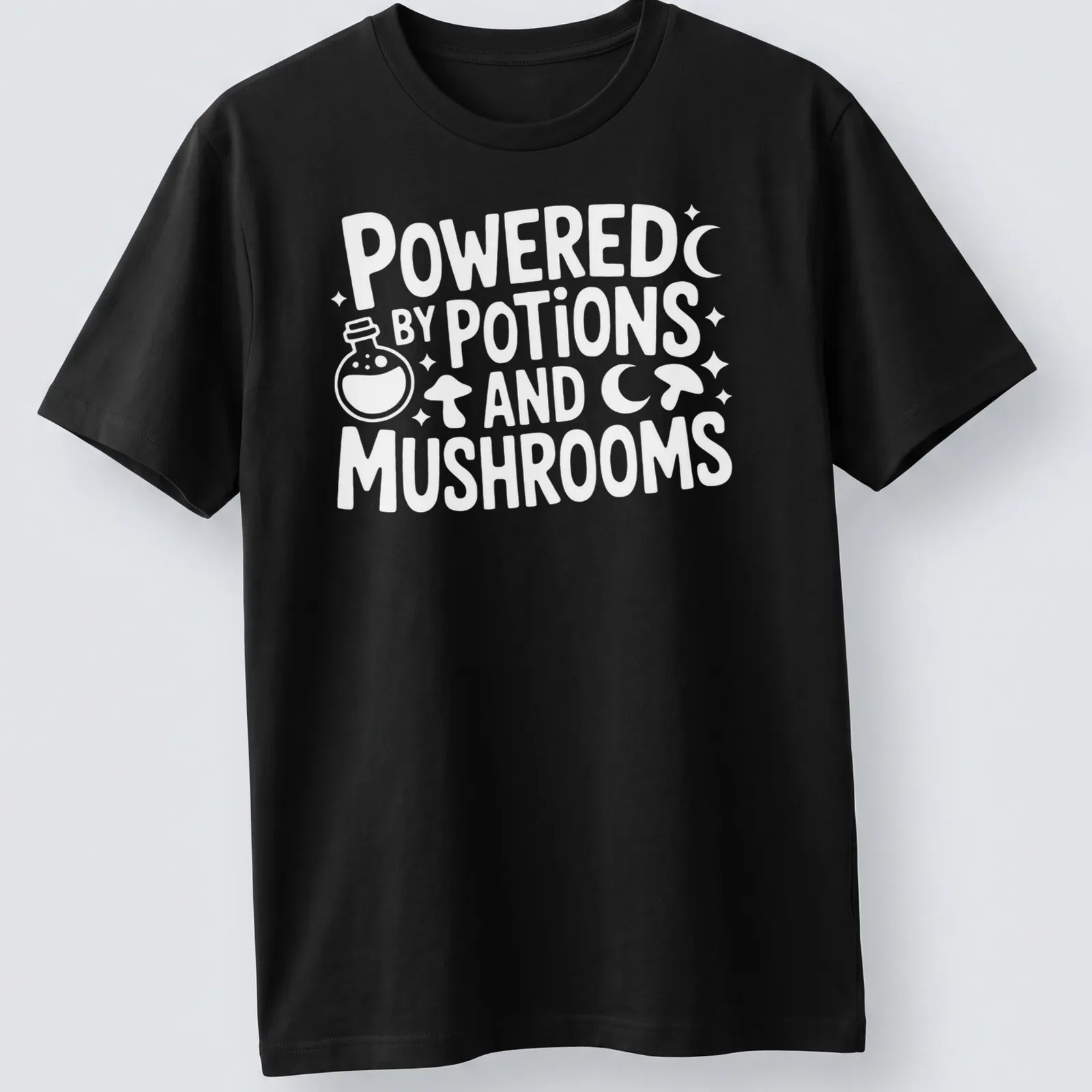Whimsical print featuring mushrooms and potions with the text 'Powered By Potions And Mushrooms' — printed on a unisex t-shirt