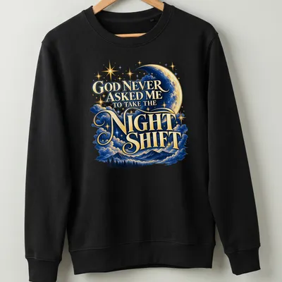 Whimsical design featuring moon and stars with humorous text about night shifts — printed on a unisex sweatshirt