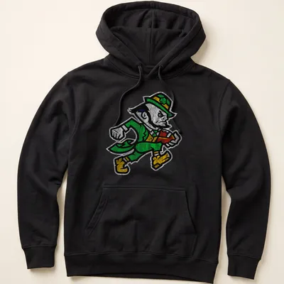 Vintage distressed Notre Dame Leprechaun graphic in green, yellow, black, and white — printed on a unisex hoodie