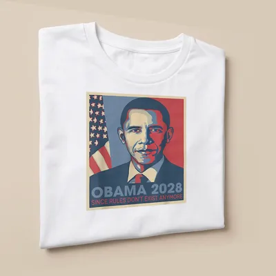 Retro t-shirt with the text 'Obama 2028 Since Rules Don't Exist Anymore' in blue, red, and white — printed on a unisex t-shirt (angled view)