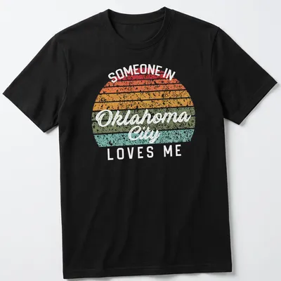 Retro distressed t-shirt with the phrase 'Someone in Oklahoma City Loves Me' in bright colors