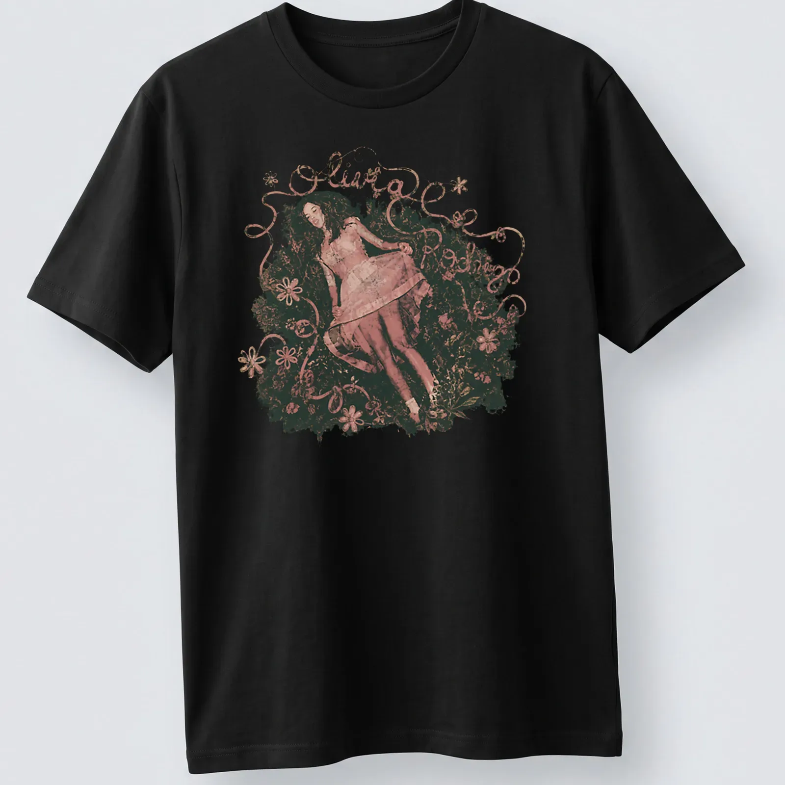 Vintage floral design featuring Olivia Rodrigo's name in an elegant font — printed on a unisex t-shirt