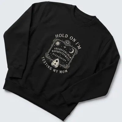 Vintage Ouija board design with humorous text about texting mom. — printed on a unisex sweatshirt