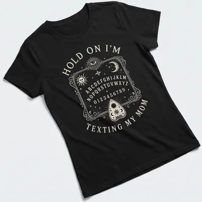 Vintage Ouija board design with humorous text about texting mom. — printed on a women's shirt