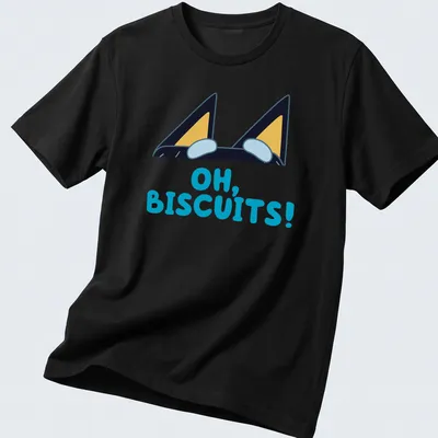 Cartoon design of peeking dog ears with text reading 'OH, BISCUITS!' in various colors