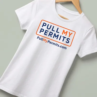 Bold typography shirt with the text Pull My Permits and website — printed on a women's shirt