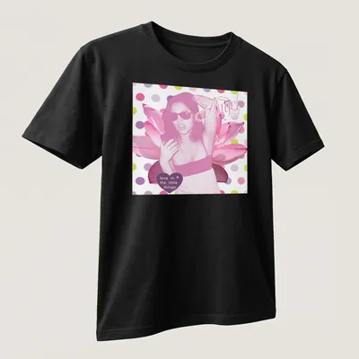Pop art Pink Angel with sunglasses and lotus flowers wearing text about love — printed on a unisex t-shirt (angled view)