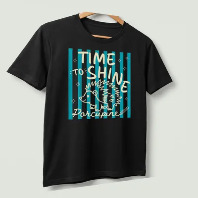 Playful line-art of a porcupine with the text 'TIME TO SHINE' in turquoise and cream — printed on a unisex t-shirt (angled view)