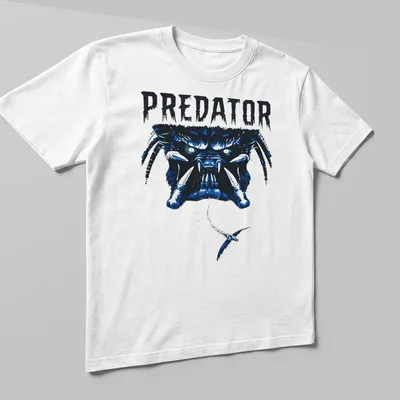 Bold graphic of the Predator face with striking blue and black colors. — printed on a unisex t-shirt (angled view)