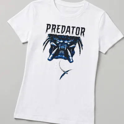 Bold graphic of the Predator face with striking blue and black colors. — printed on a women's shirt