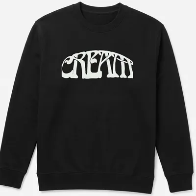 Psychedelic curved typography t-shirt with 'CRE8TIN' in white and black — printed on a unisex sweatshirt