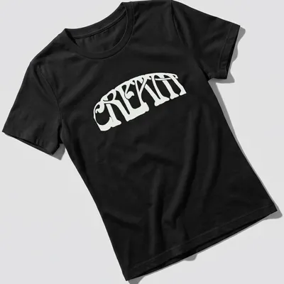 Psychedelic curved typography t-shirt with 'CRE8TIN' in white and black — printed on a women's shirt