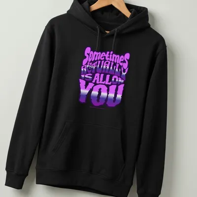 Bold gradient typography t-shirt with the phrase Sometimes It Actually Is ALL On YOU — printed on a unisex hoodie