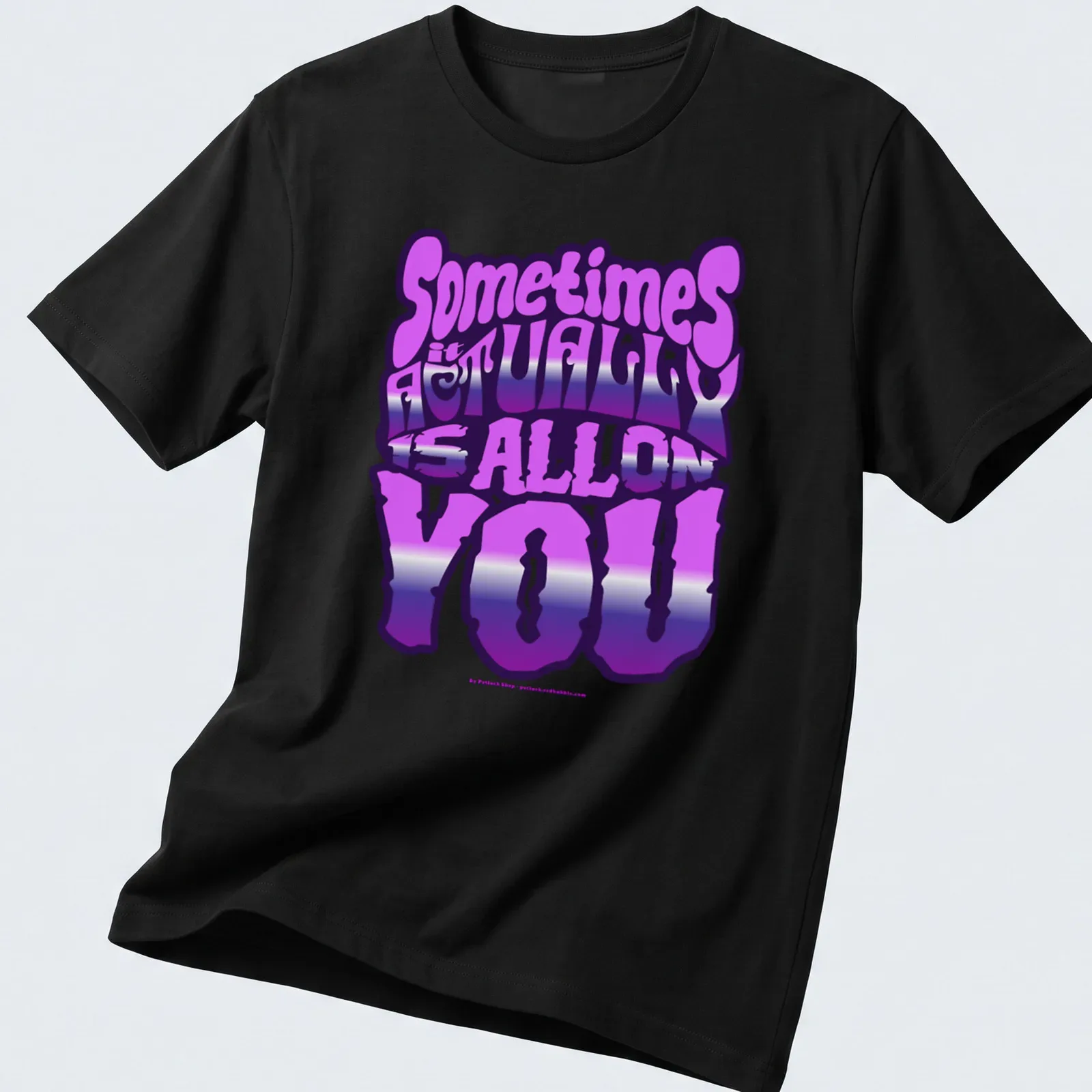 Bold gradient typography t-shirt with the phrase Sometimes It Actually Is ALL On YOU — printed on a unisex t-shirt
