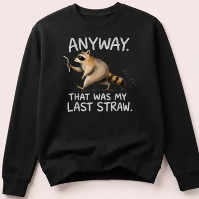 Whimsical raccoon illustration with text 'Anyway. That was my last straw.' in earthy colors — printed on a unisex sweatshirt