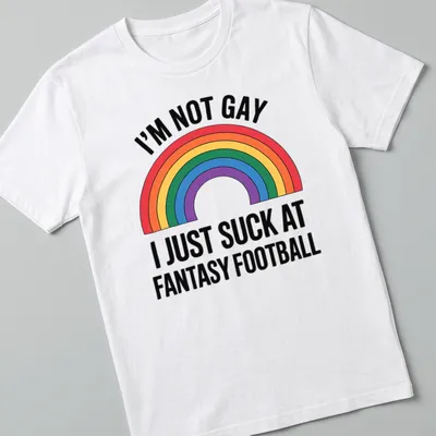Bold graphic tee featuring rainbow colors and humorous fantasy football text