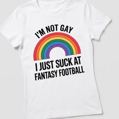 Bold graphic tee featuring rainbow colors and humorous fantasy football text — printed on a women's shirt