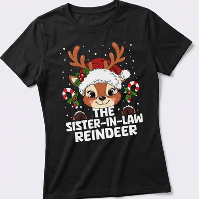 Kawaii-style reindeer with Christmas hat and text celebrating sister-in-law — printed on a women's shirt