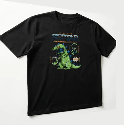 Blueprint schematic print of Reptar in green, blue, and orange with playful text — printed on a unisex t-shirt (angled view)