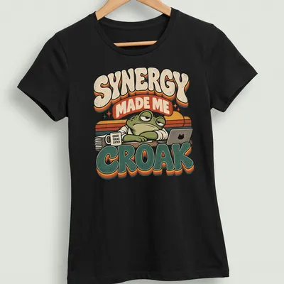 Retro graphic tee featuring a frog and humorous text about synergy and ideas — printed on a women's shirt