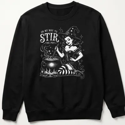 Retro witch pinup t-shirt with a playful slogan and colorful illustration. — printed on a unisex sweatshirt
