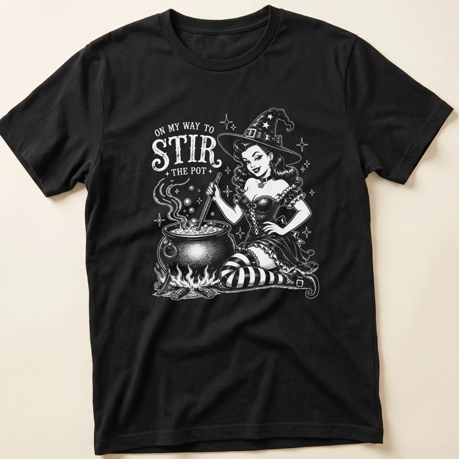 Retro witch pinup t-shirt with a playful slogan and colorful illustration. — printed on a unisex t-shirt