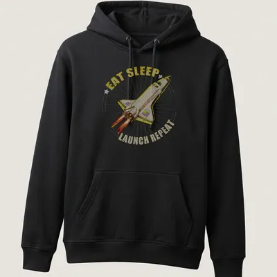 Vintage-style tee featuring a rocket and the text 'EAT SLEEP LAUNCH REPEAT' — printed on a unisex hoodie