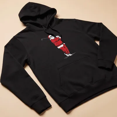 Minimalist Santa Claus illustration playing golf in red and white — printed on a unisex hoodie