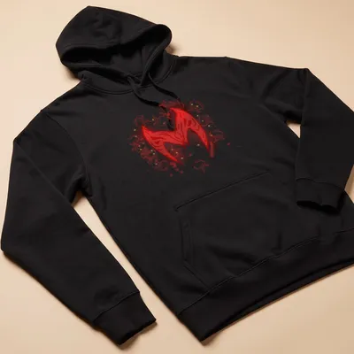 Scarlet Witch symbol illustrated in red and gold with magical effects — printed on a unisex hoodie