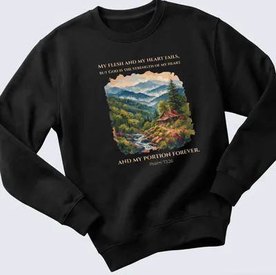 Realistic cabin landscape t-shirt with Psalm 73:26 printed text — printed on a unisex sweatshirt