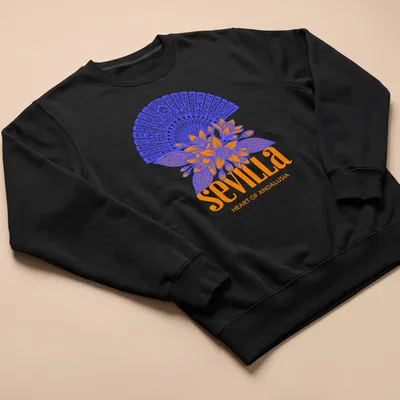 Vibrant floral fan graphic with Sevilla Heart of Andalusia text in blue and orange — printed on a unisex sweatshirt